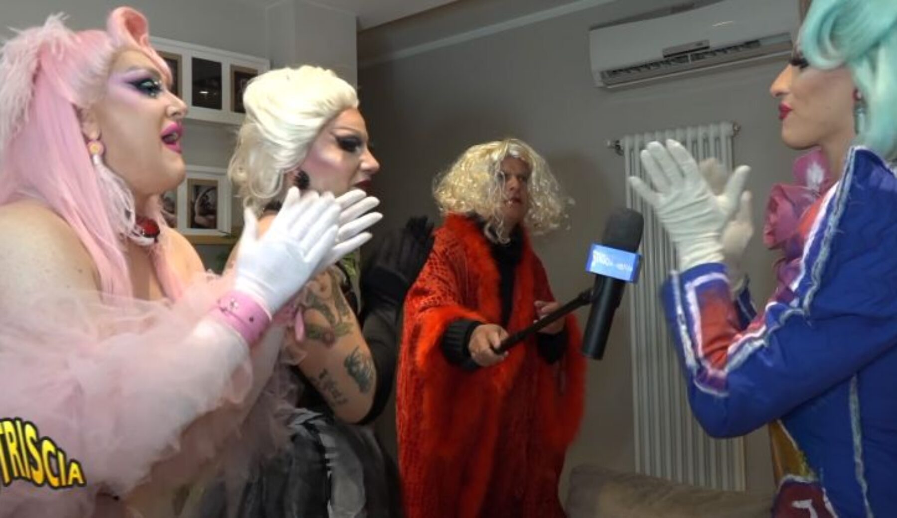 Anteprima Striscia, Enrico Lucci in missione tra le drag queen: con la parrucca si diventa geni?