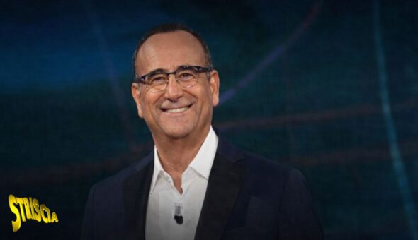 Immagini esclusive: Carlo Conti canta